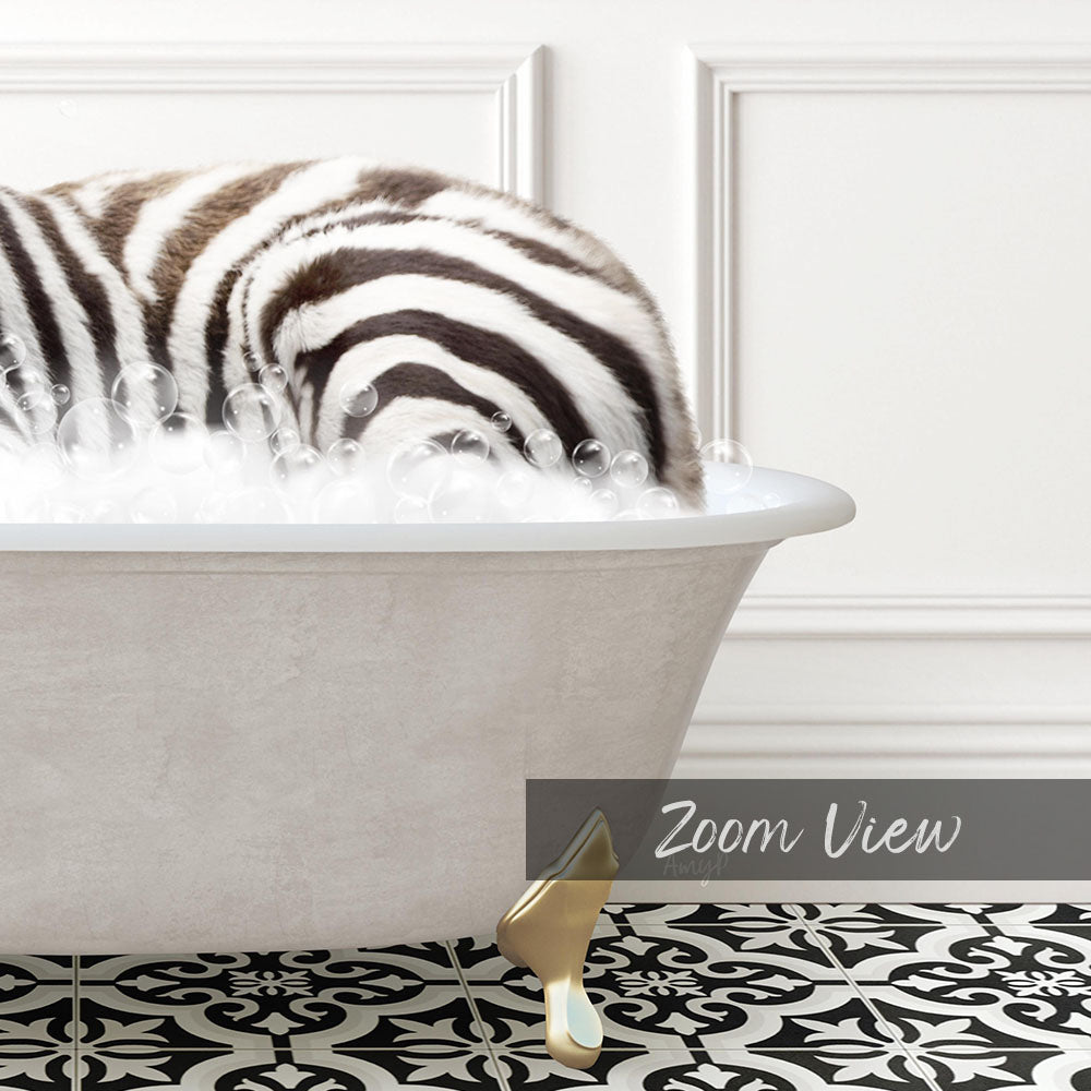 A zebra lying in a bathtub filled with bubbles, with a text overlay that reads "Zoom View".