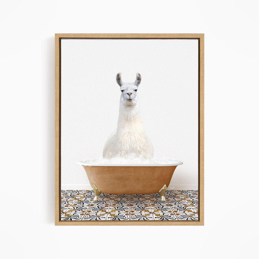 A white llama sitting in a bathtub filled with bubbles, surrounded by a patterned tile floor.
