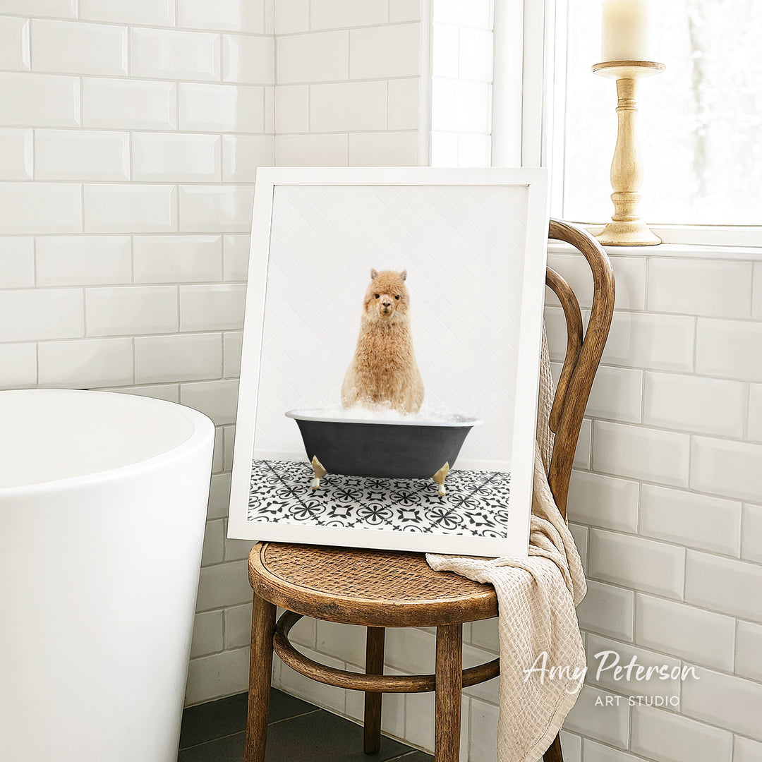A framed image of a small dog sitting in a bathtub, surrounded by a black and white patterned tile floor.