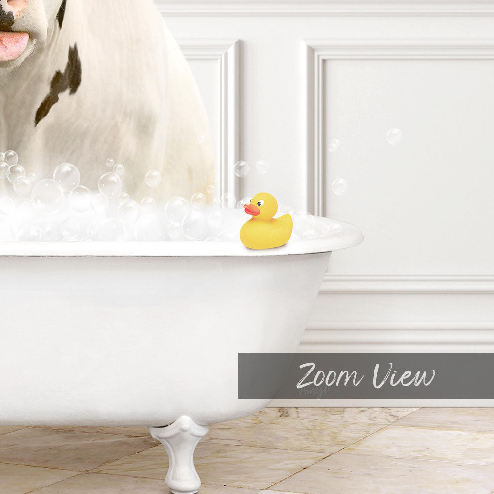 A white bathtub filled with bubbles, with a yellow rubber duck sitting in the water.