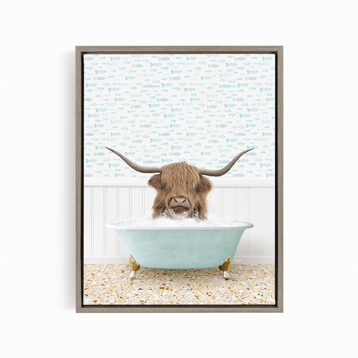 A brown cow with long horns is sitting in a light blue bathtub filled with water, surrounded by a pattern of fish.