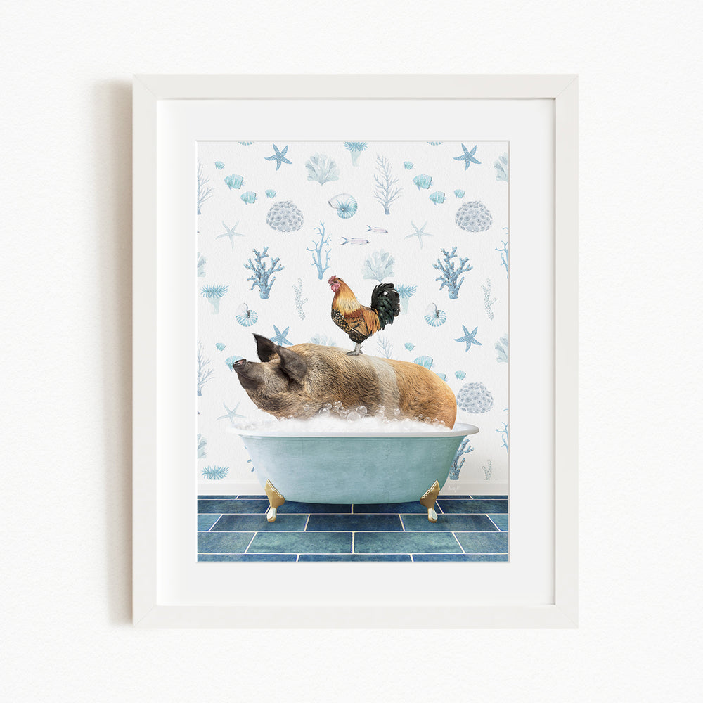A framed collage depicting a pig sitting in a bathtub, with a rooster perched on its back, against a backdrop of blue and white seashells and starfish.