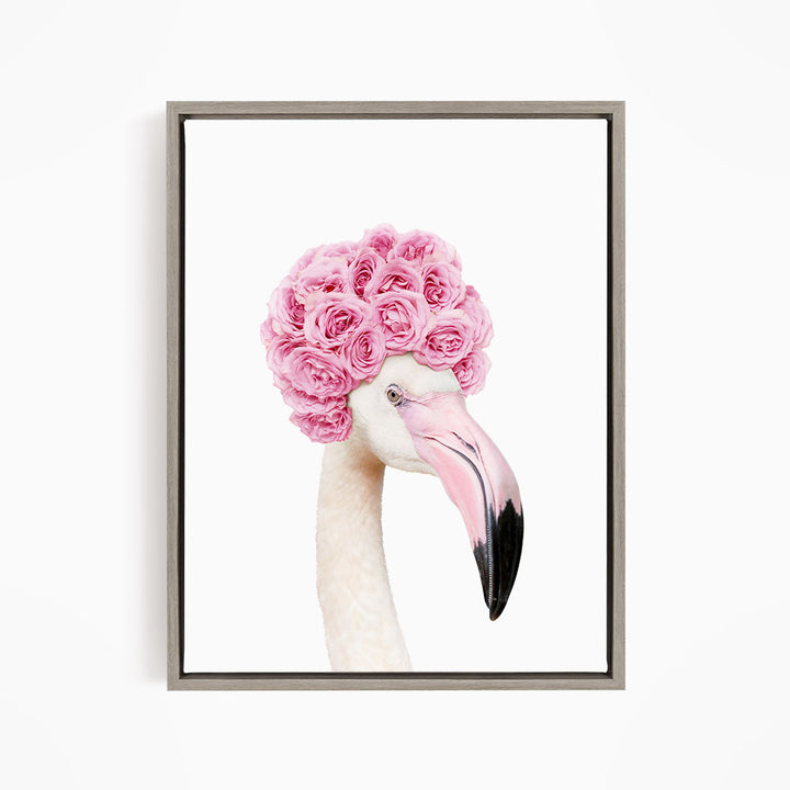 A flamingo with a pink flower crown on its head.