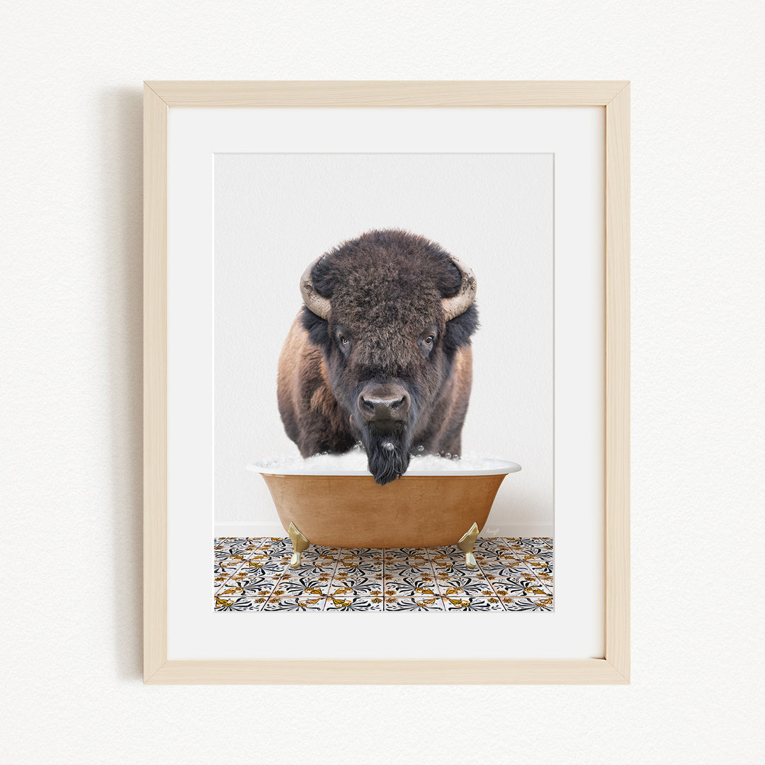 A buffalo with large horns is standing in a bathtub filled with water, creating a playful and whimsical scene.