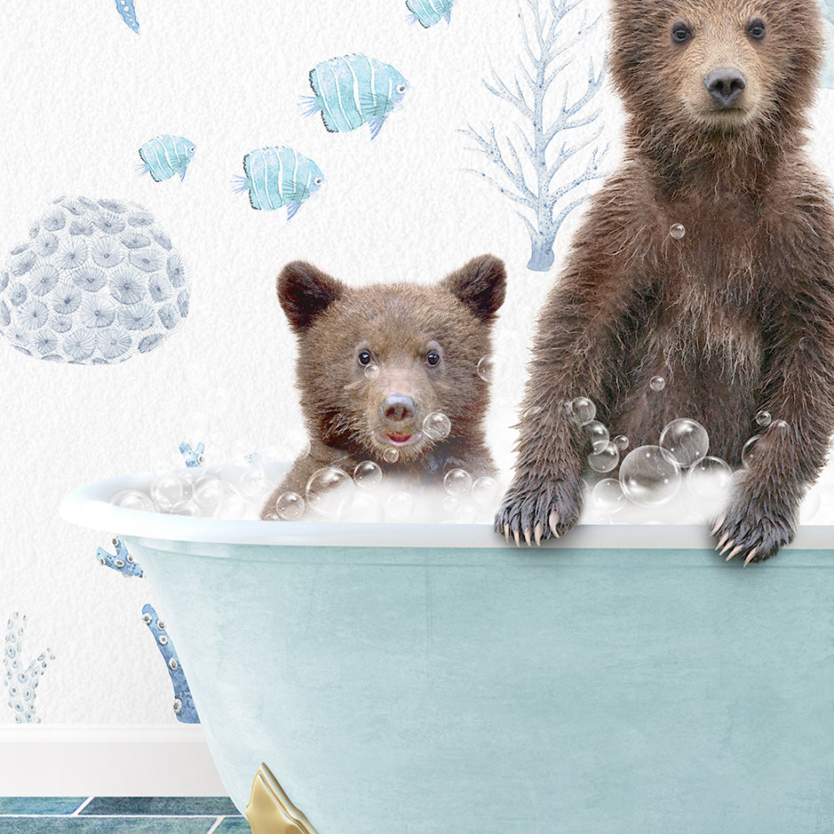 two brown bears are sitting in a bathtub