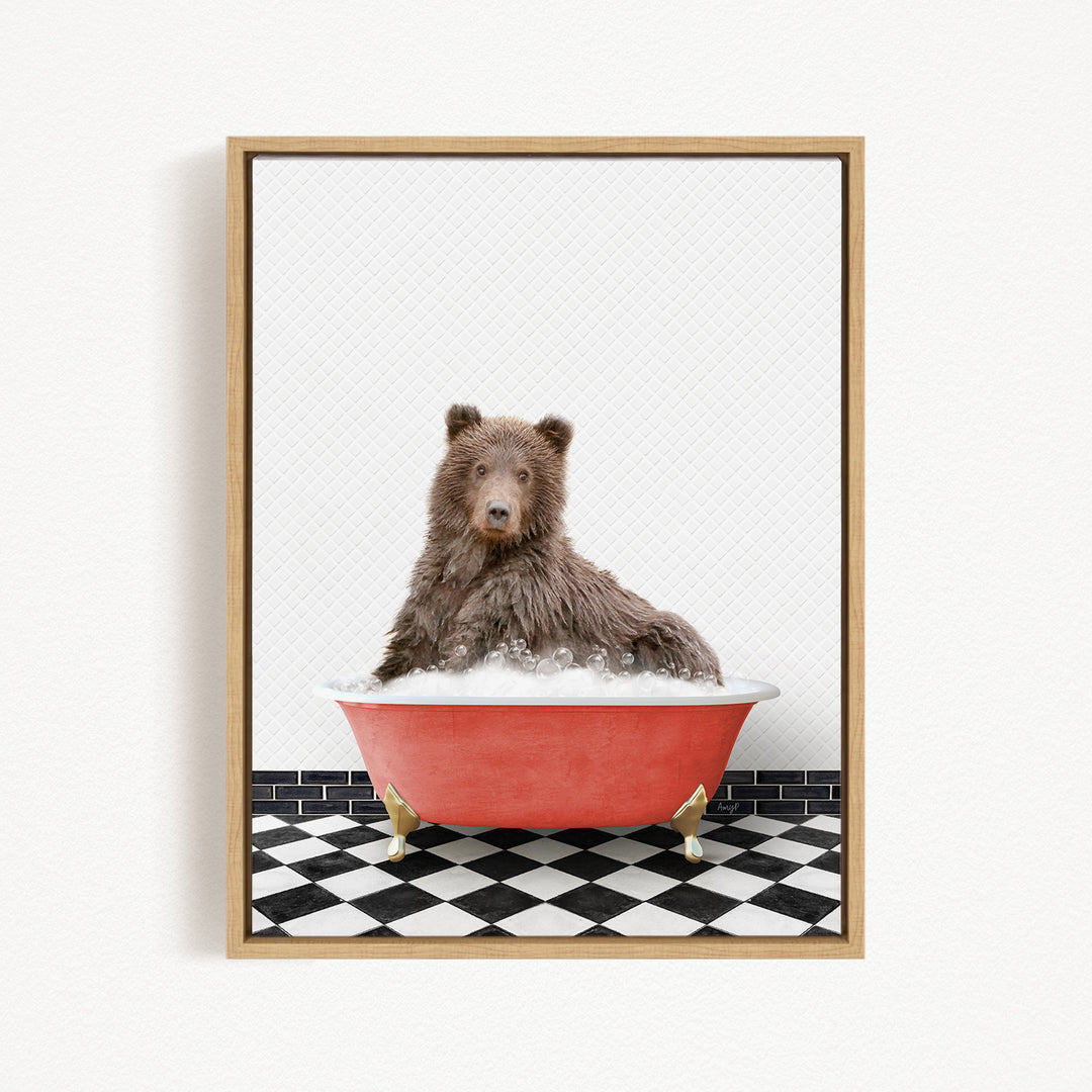 A brown bear sitting in a red bathtub filled with bubbles, with a black and white checkered floor in the background.