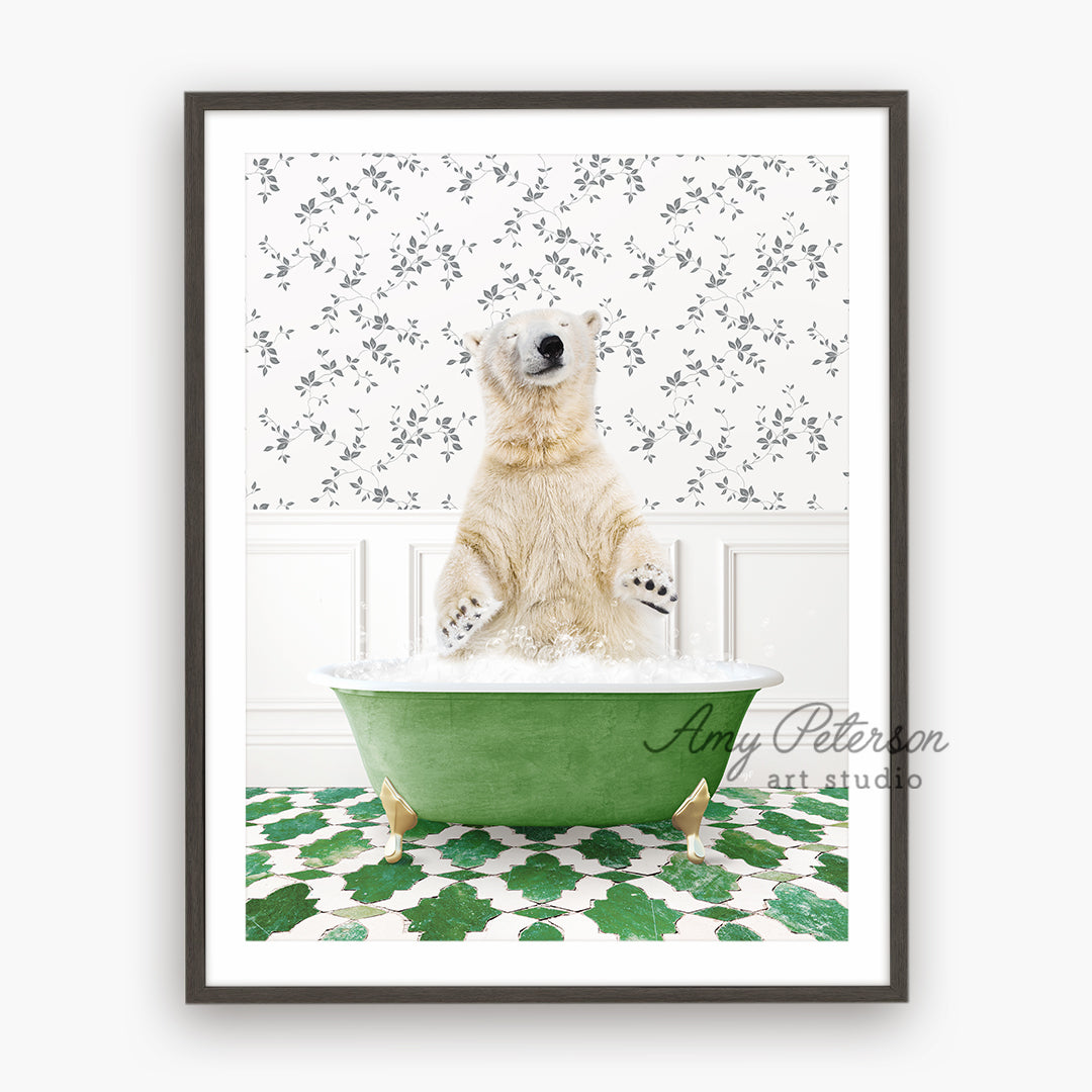 a polar bear sitting in a green bath tub