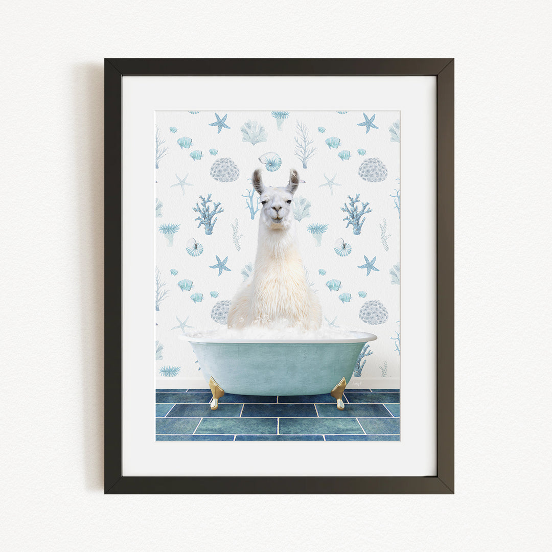 A white llama sitting in a blue bathtub filled with bubbles, surrounded by a pattern of blue and white seashells and starfish.