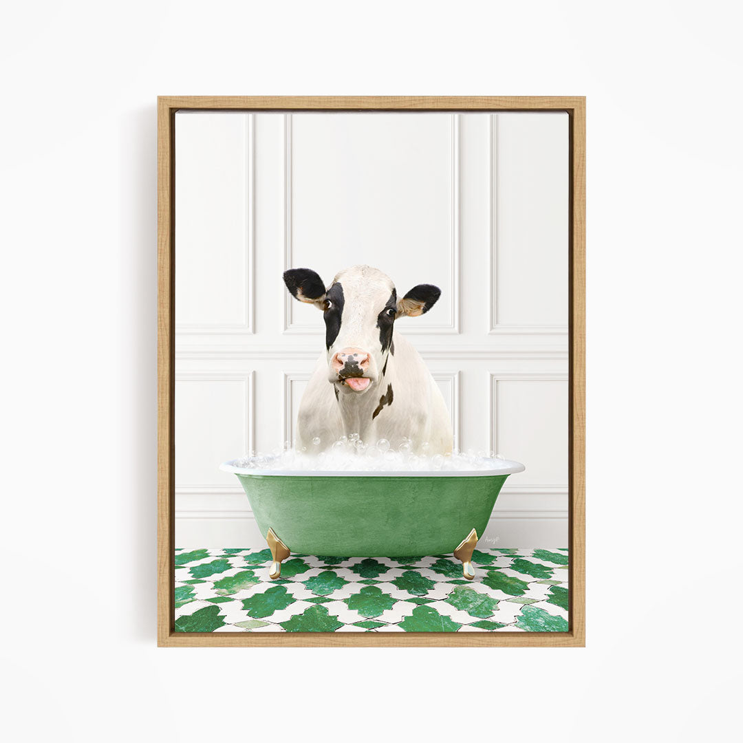 A black and white cow is sitting in a green bathtub filled with water, creating a whimsical and humorous scene.