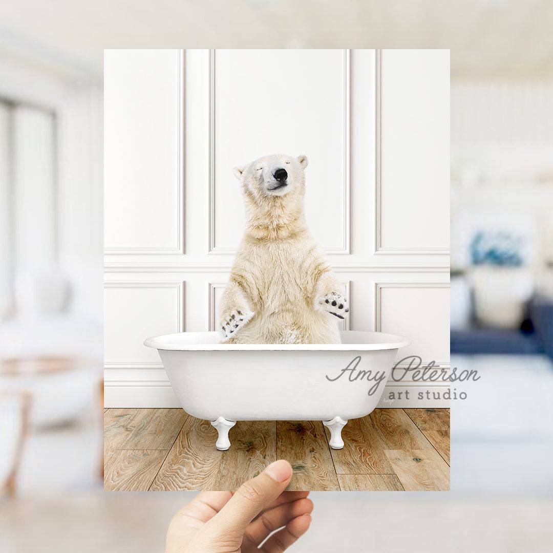 a polar bear sitting in a bath tub