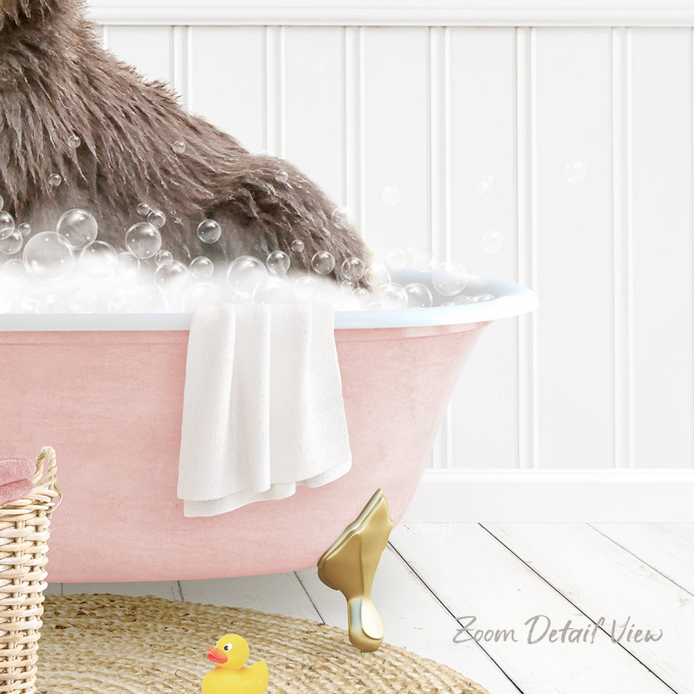 A fluffy brown dog is sitting in a pink bathtub filled with bubbles, surrounded by a yellow rubber duck and a white towel.