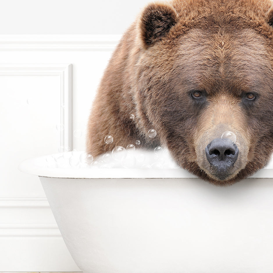 a large brown bear standing on top of a bath tub