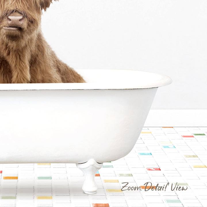 A brown cow is sitting in a white bathtub, with a colorful tiled floor in the background.