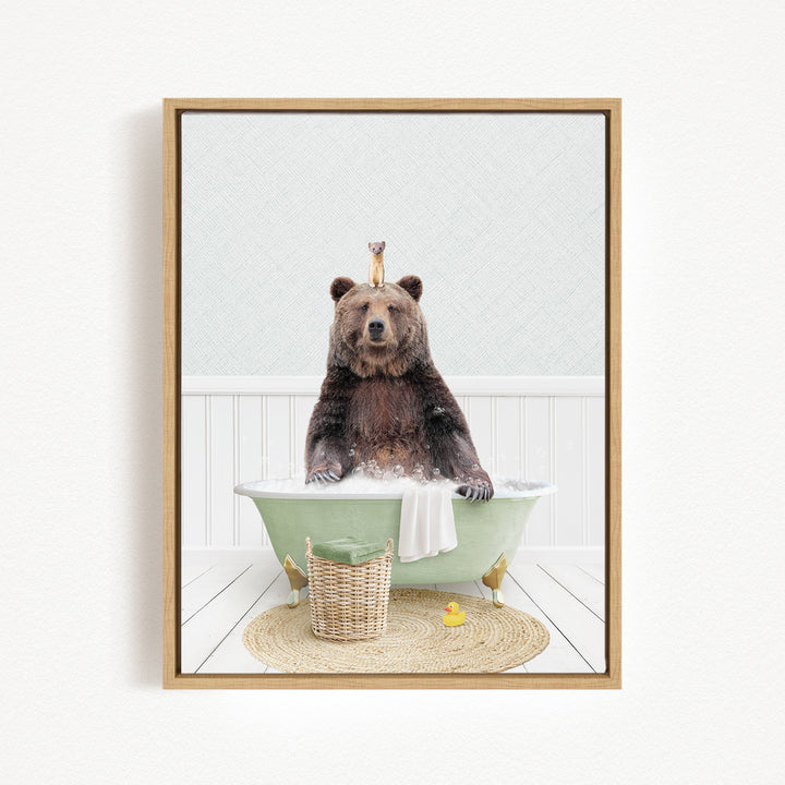A brown bear sitting in a green bathtub, surrounded by a basket of toys and a yellow rubber duck.
