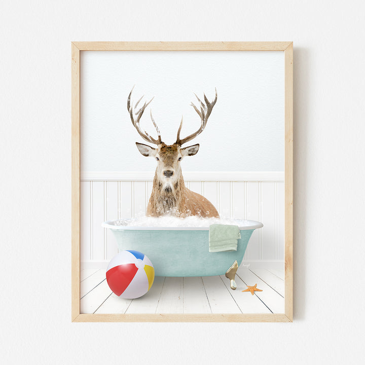 a picture of a deer in a bathtub with a beach ball