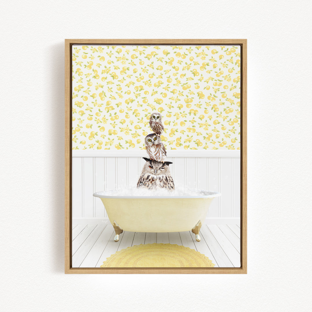 A framed image depicting a cat sitting in a bathtub filled with water, surrounded by a yellow floral pattern on the wall behind it.