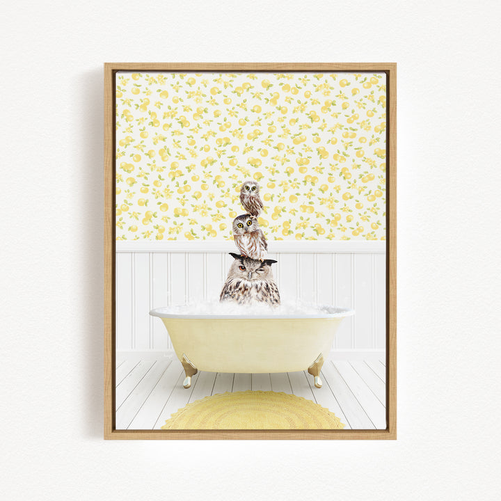 A framed image depicting a cat sitting in a bathtub filled with water, surrounded by a yellow floral pattern on the wall behind it.