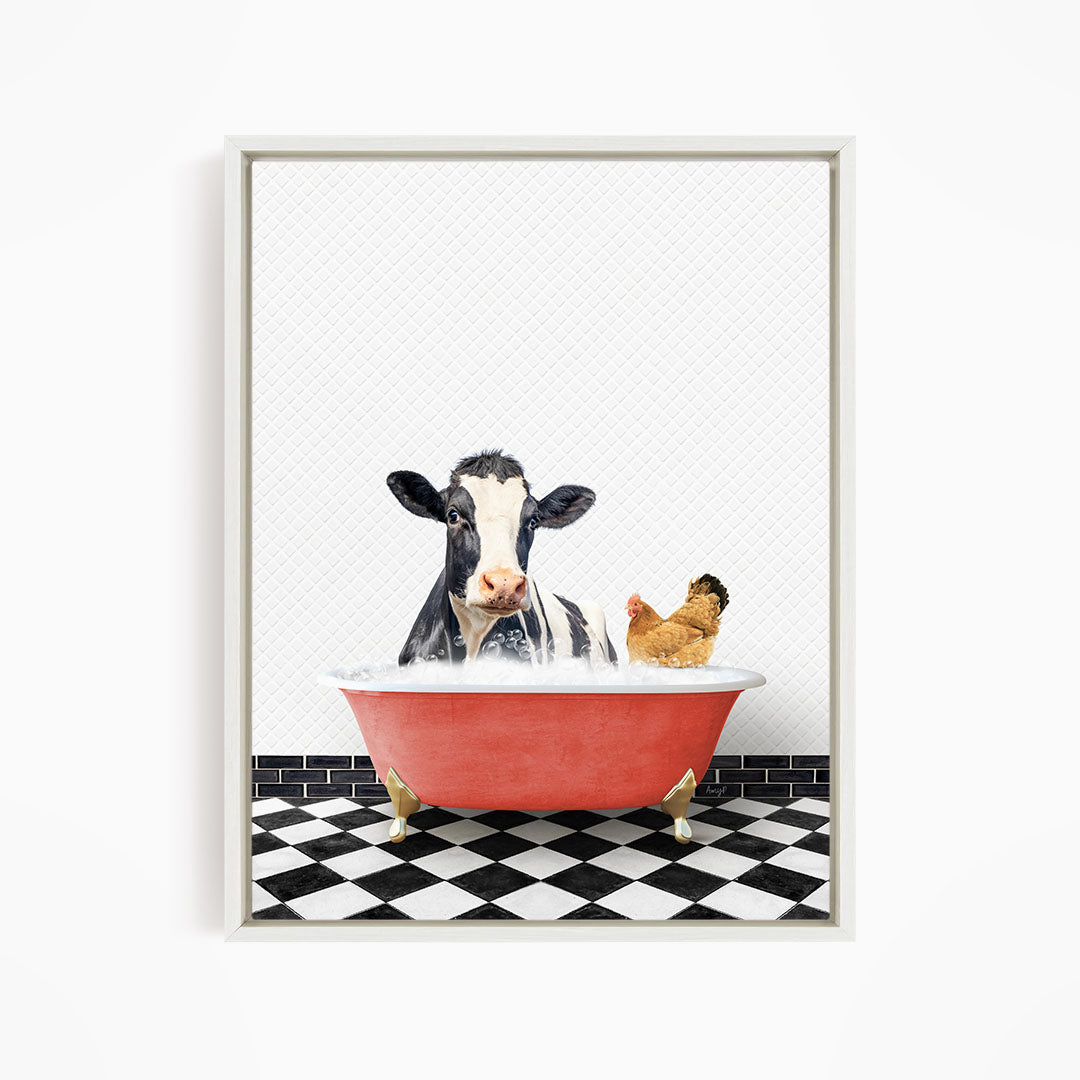A black and white cow is sitting in a red bathtub, with a chicken standing nearby, in a black and white checkered floor.