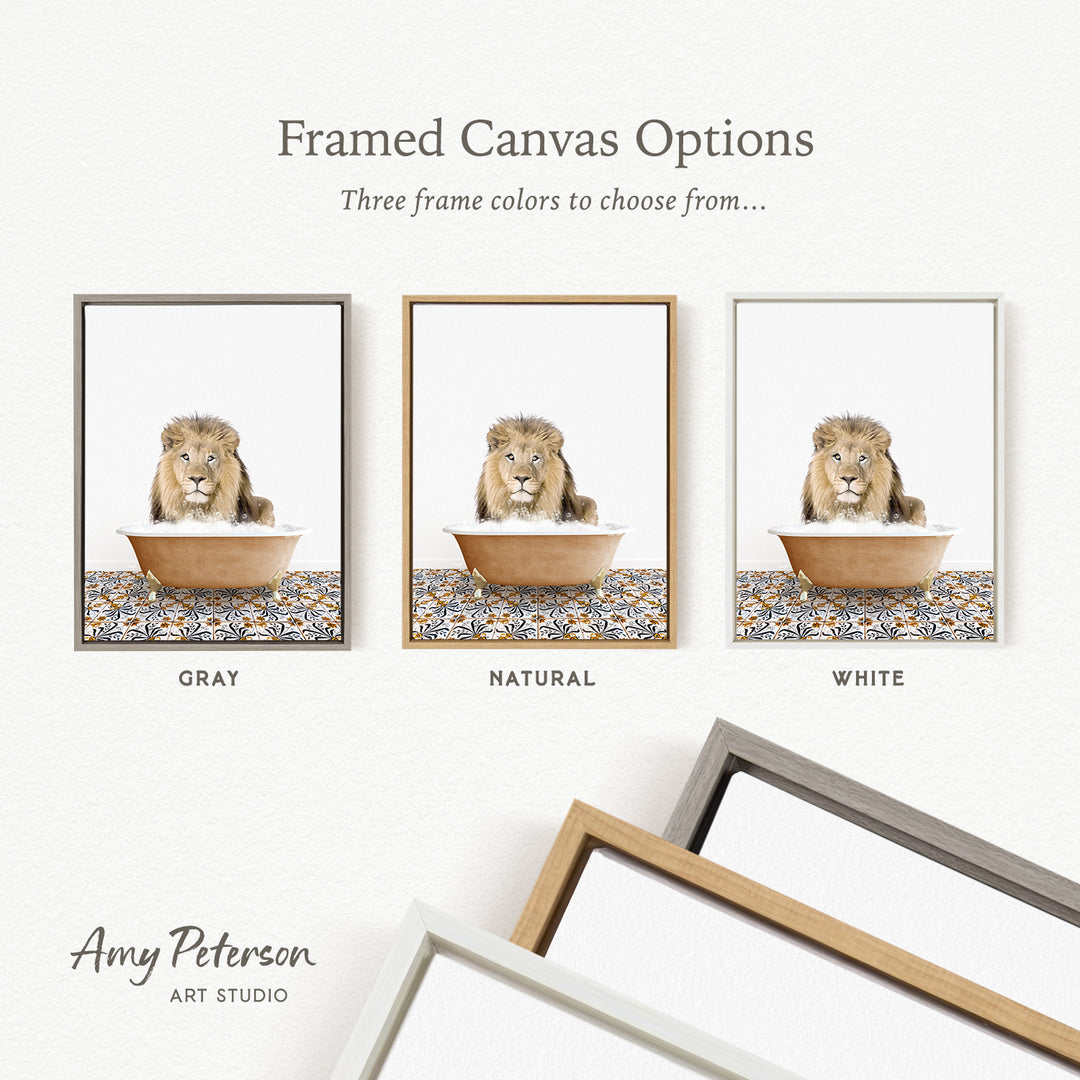 The image is a framed canvas option featuring three different colored frames, each containing a painting of a lion in a bathtub.