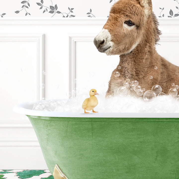 a donkey in a bathtub with bubbles and a rubber duck