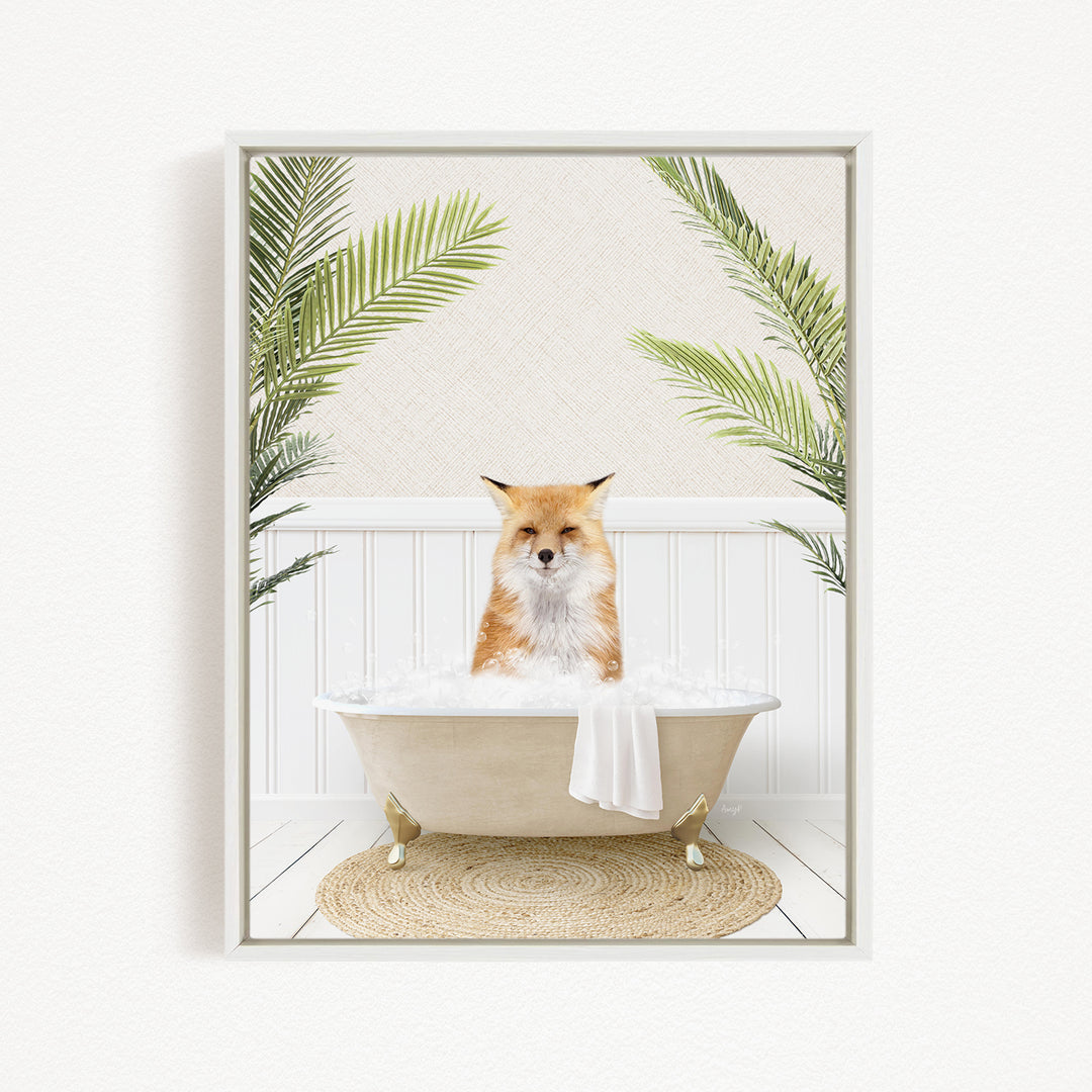 A red fox is sitting in a white bathtub filled with bubbles, surrounded by green palm leaves.