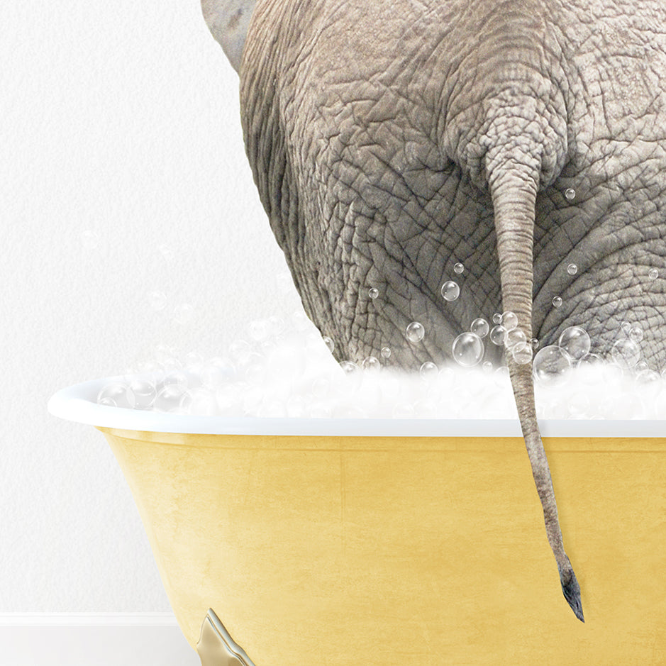 an elephant is taking a bath in a bathtub