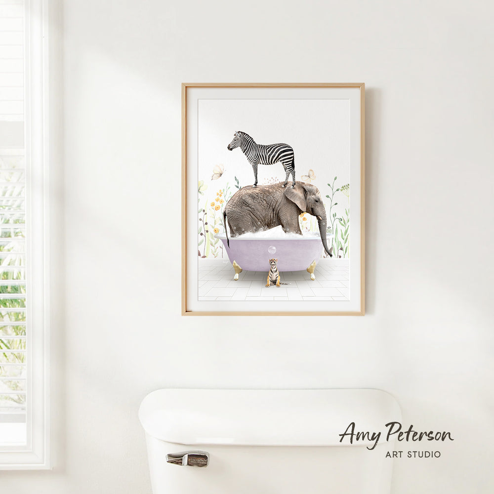 A framed illustration of a zebra standing on an elephant's back, with a dog sitting on the elephant's head, is displayed on a white wall.