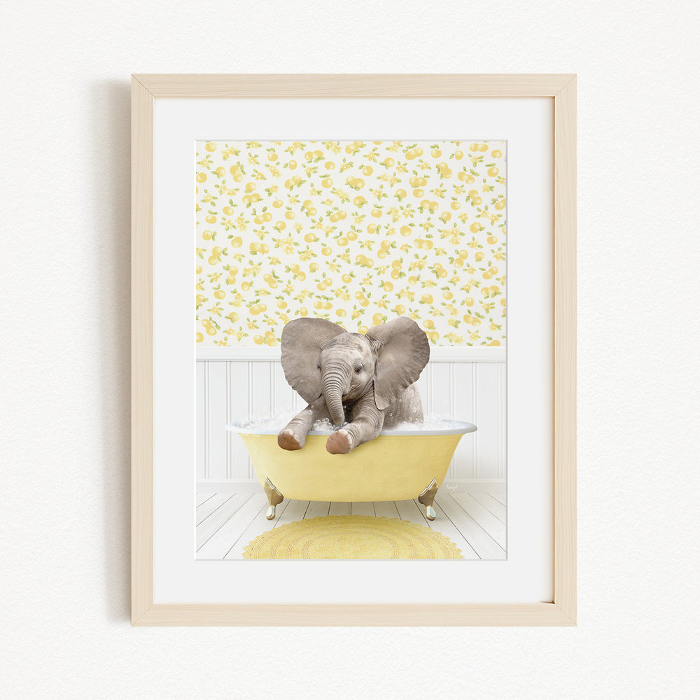A baby elephant sitting in a yellow bathtub, surrounded by a yellow and white floral pattern on the wall behind it.