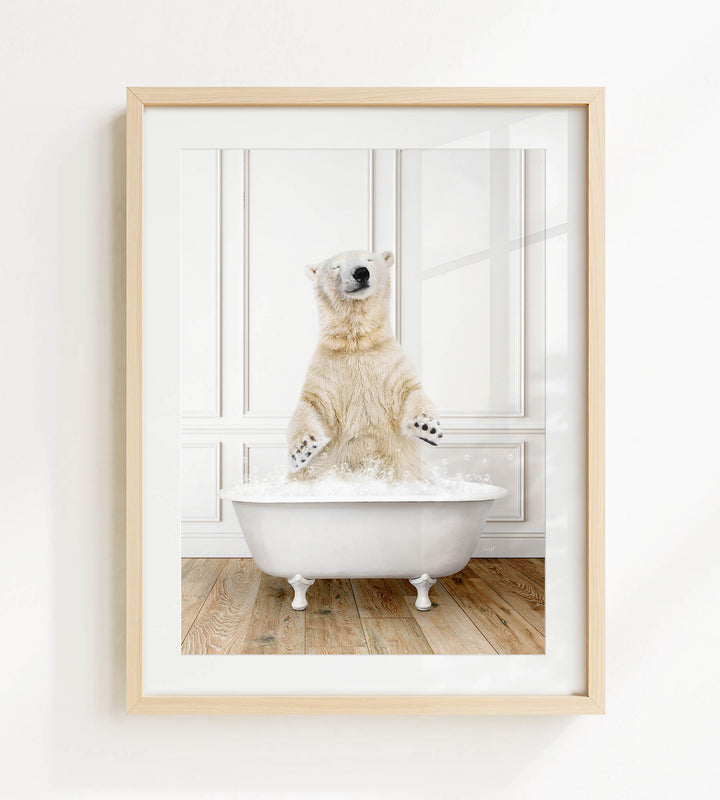 A polar bear sitting in a white bathtub filled with water, appearing to be enjoying a bath.