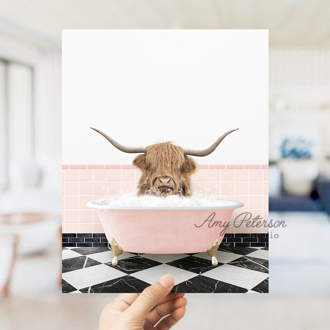 a person holding up a card with a picture of a bull in a bathtub