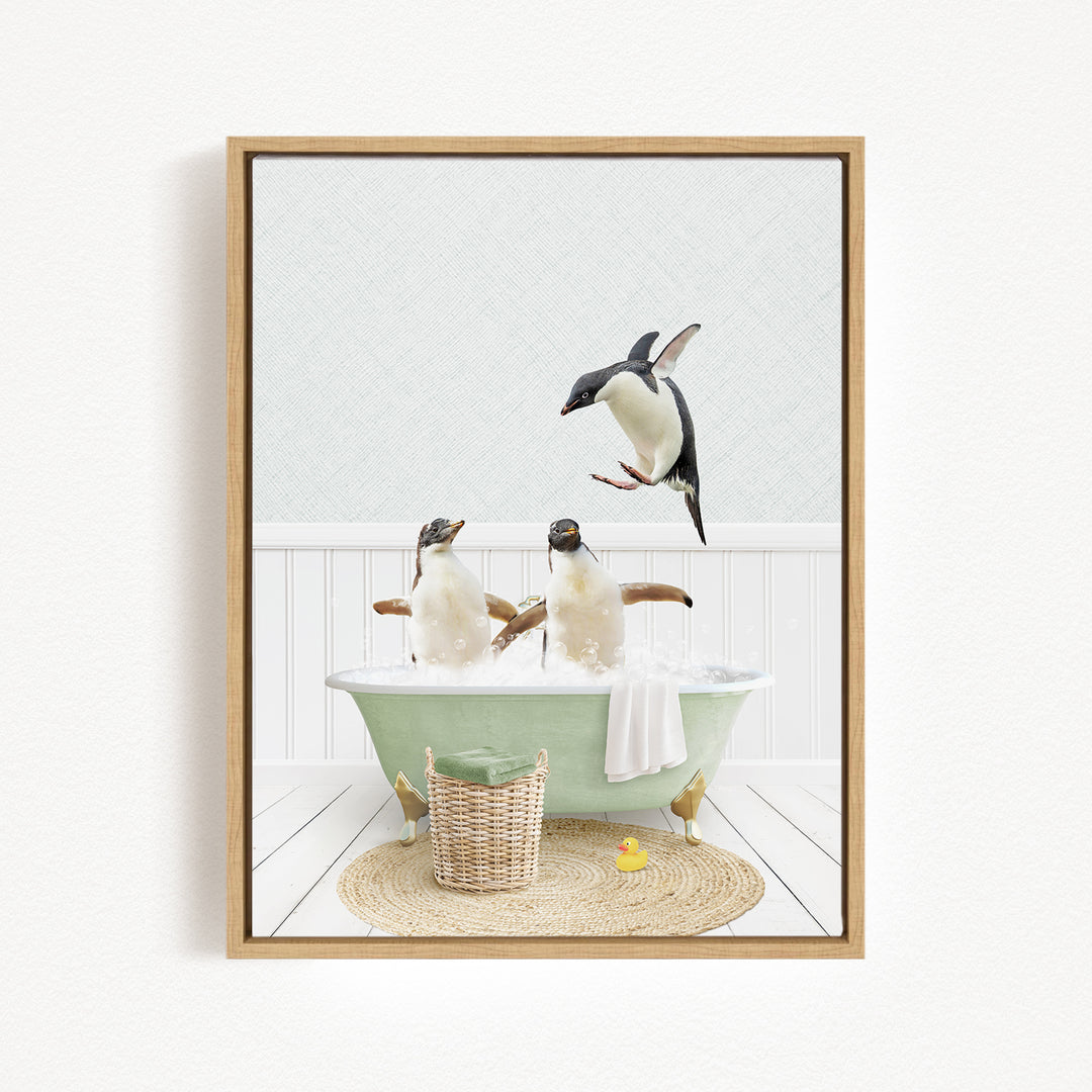 A framed image depicting two penguins sitting in a green bathtub, with one penguin flying towards the other.