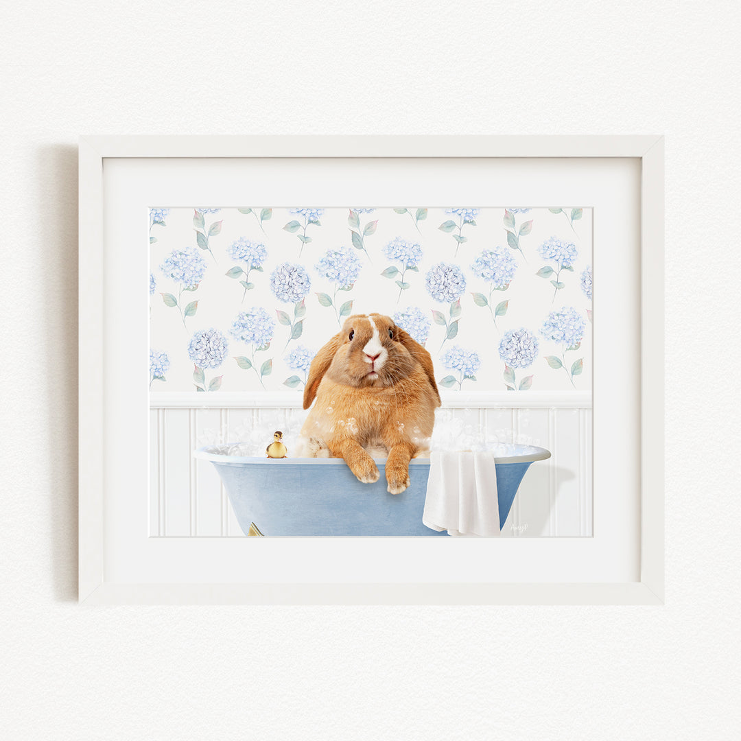 A brown rabbit sitting in a blue bathtub filled with water, surrounded by blue hydrangea flowers.