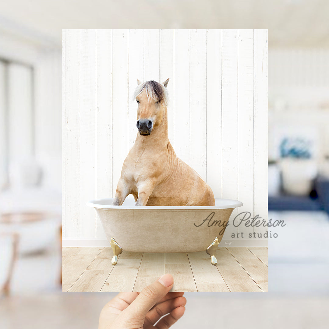 a horse is taking a bath in a bathtub