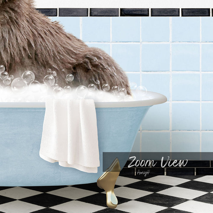 A fluffy brown dog is sitting in a blue bathtub filled with bubbles, with a white towel and gold bathtub stopper nearby.