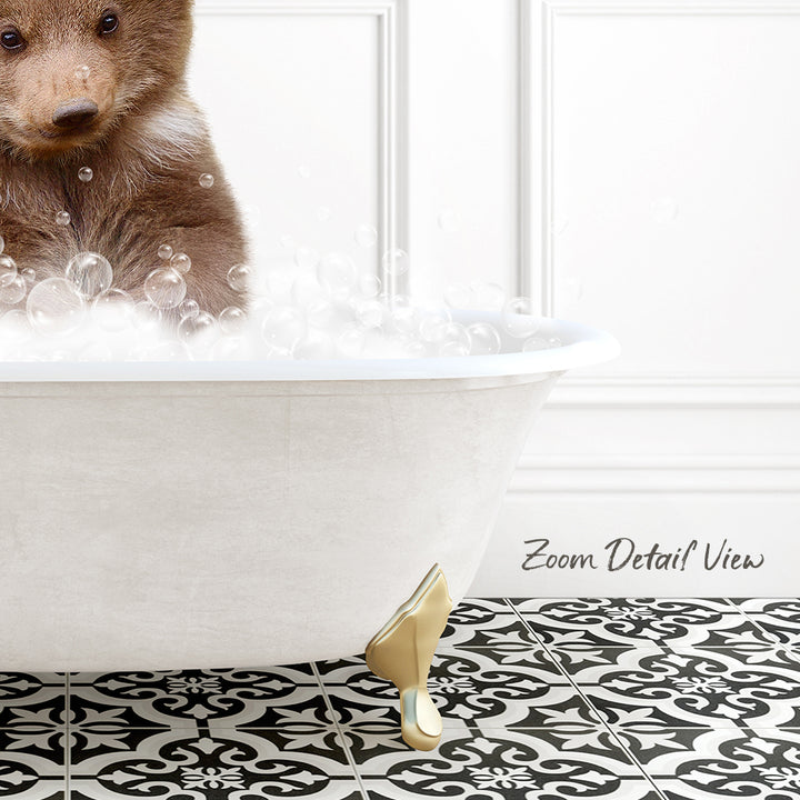 A brown bear is sitting in a white bathtub filled with bubbles, creating a whimsical and playful scene.