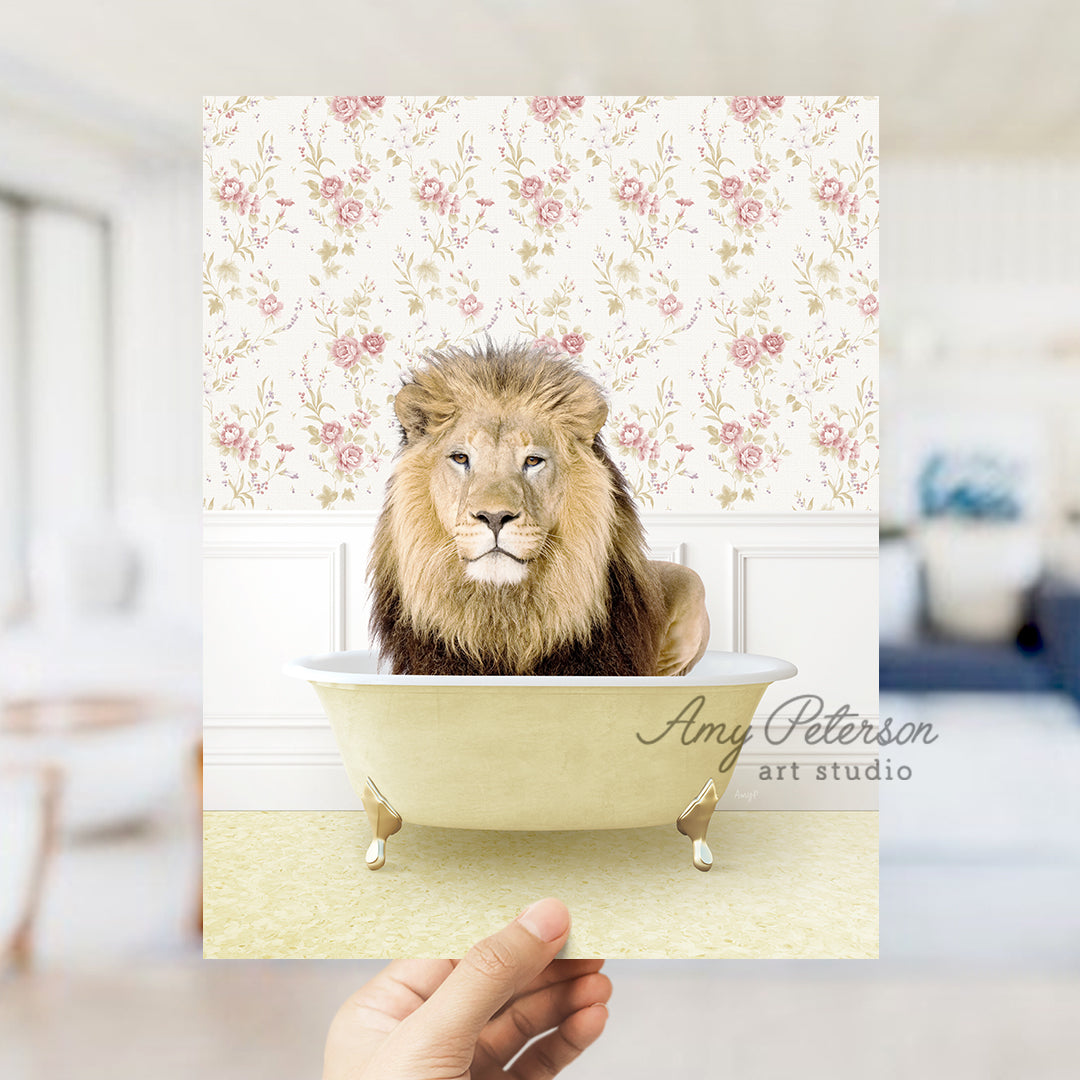 a hand holding a card with a lion in a bathtub