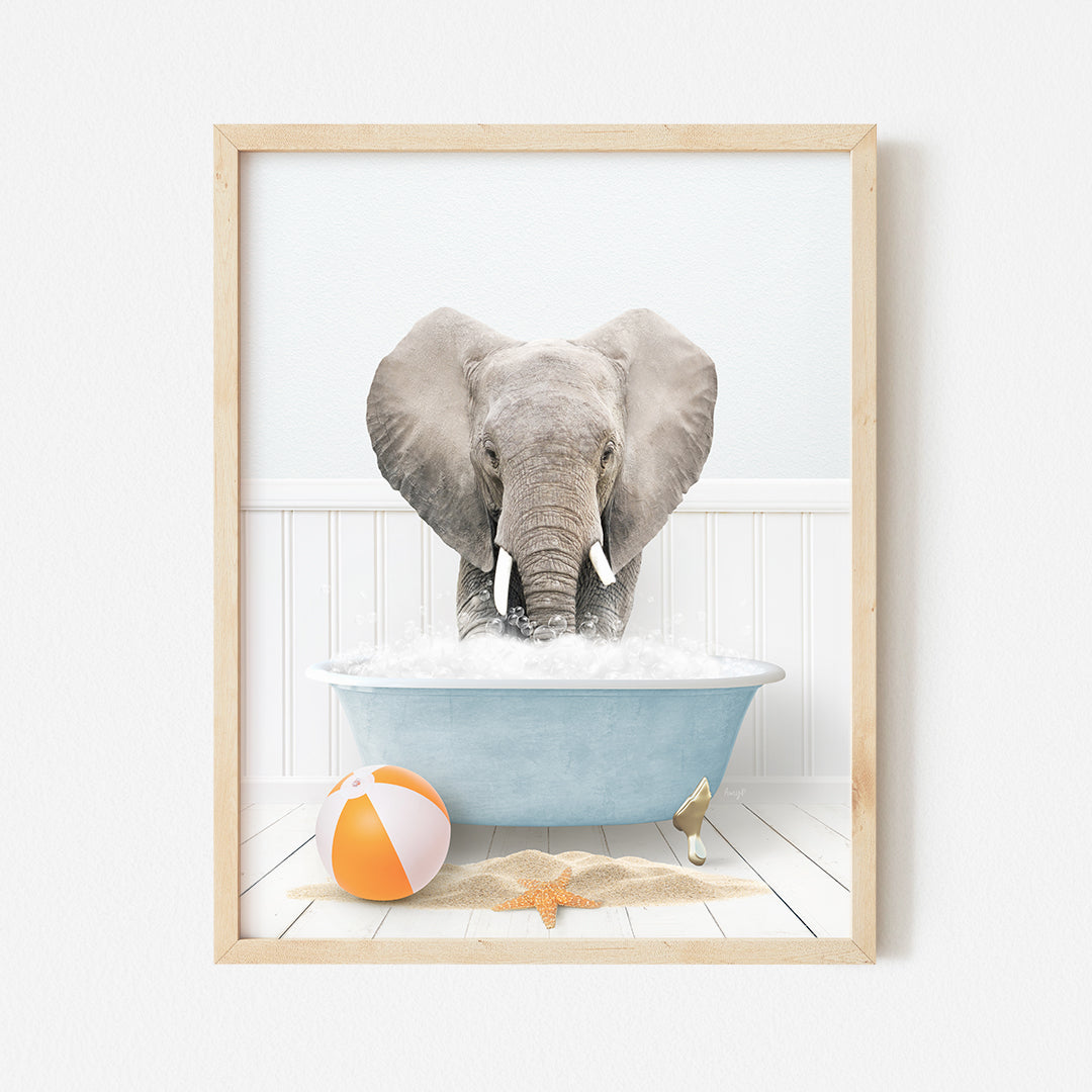 a picture of an elephant taking a bath