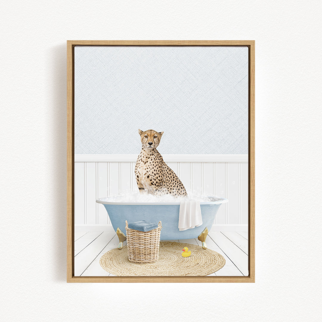 A cheetah sitting in a blue bathtub filled with water, surrounded by a yellow rubber duck and a woven basket.