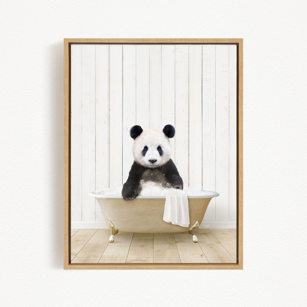 A panda bear sitting in a bathtub, with its head resting on a towel.