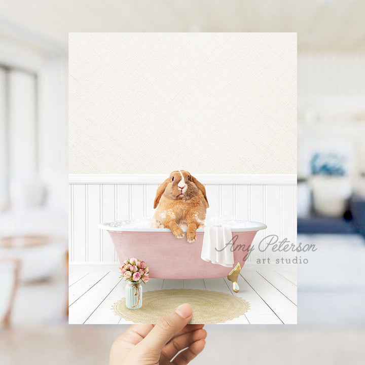 a person holding up a picture of a dog in a bathtub