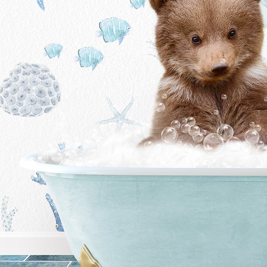 a brown bear sitting in a bath tub filled with bubbles