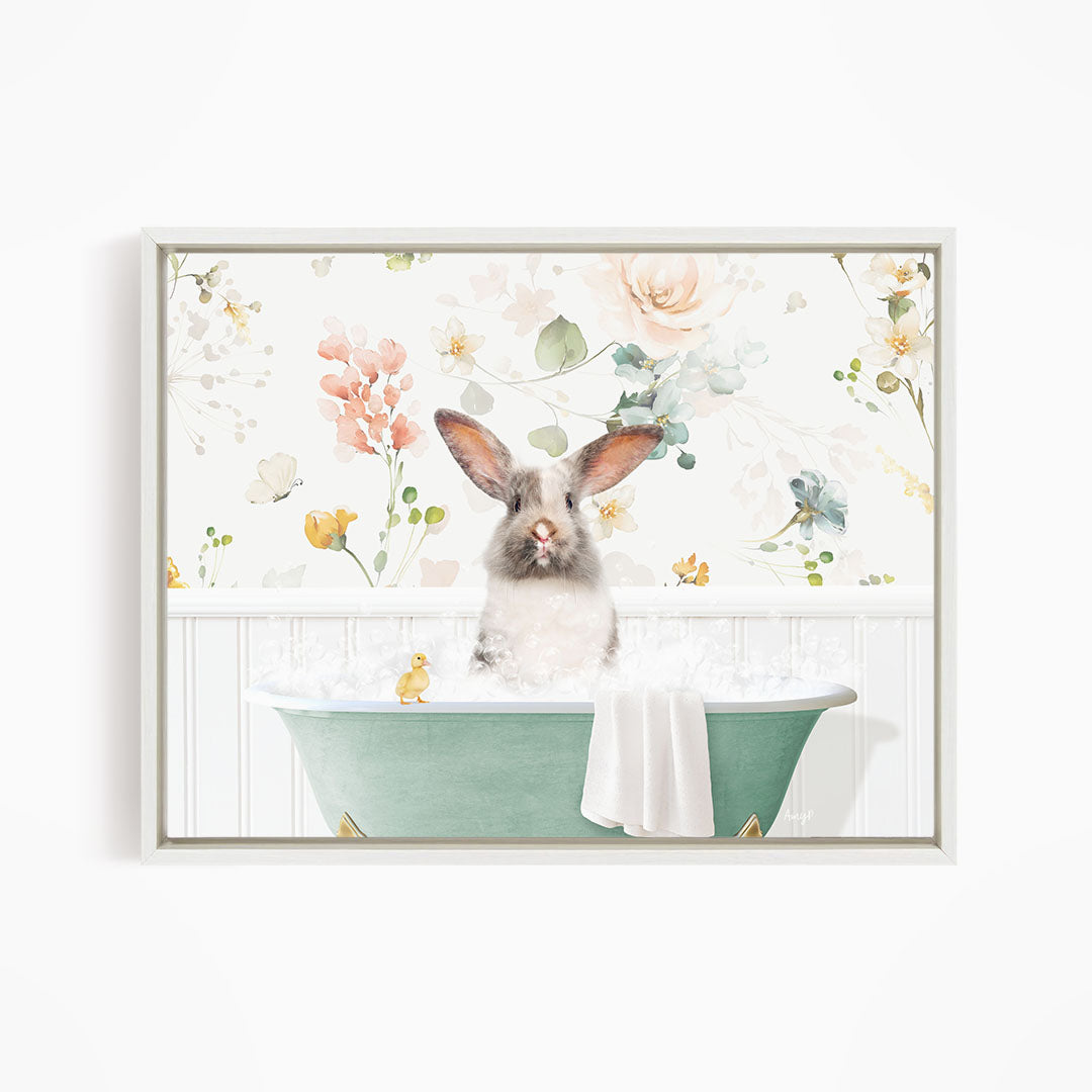 A white rabbit sitting in a green bathtub filled with bubbles, surrounded by a floral pattern.