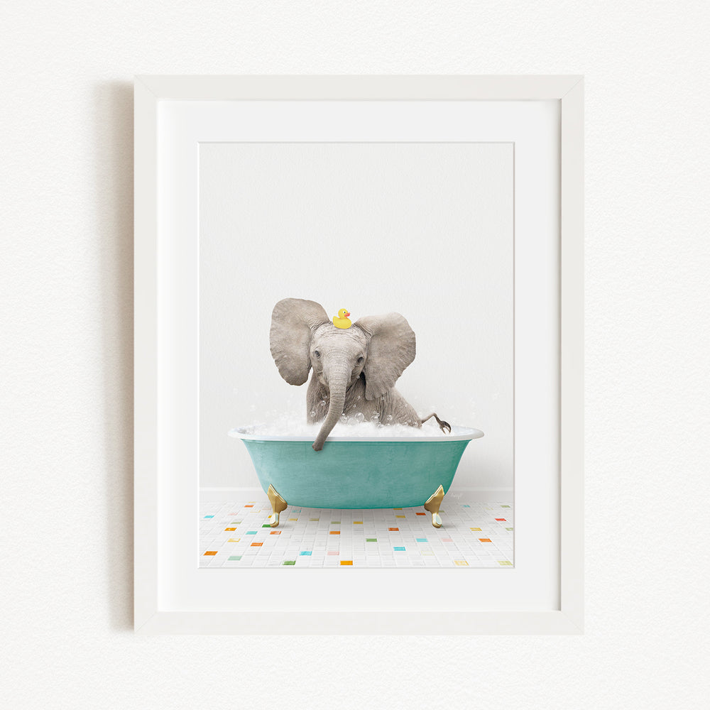 A gray elephant is sitting in a blue bathtub, surrounded by small yellow duck-shaped objects, creating a whimsical and playful scene.