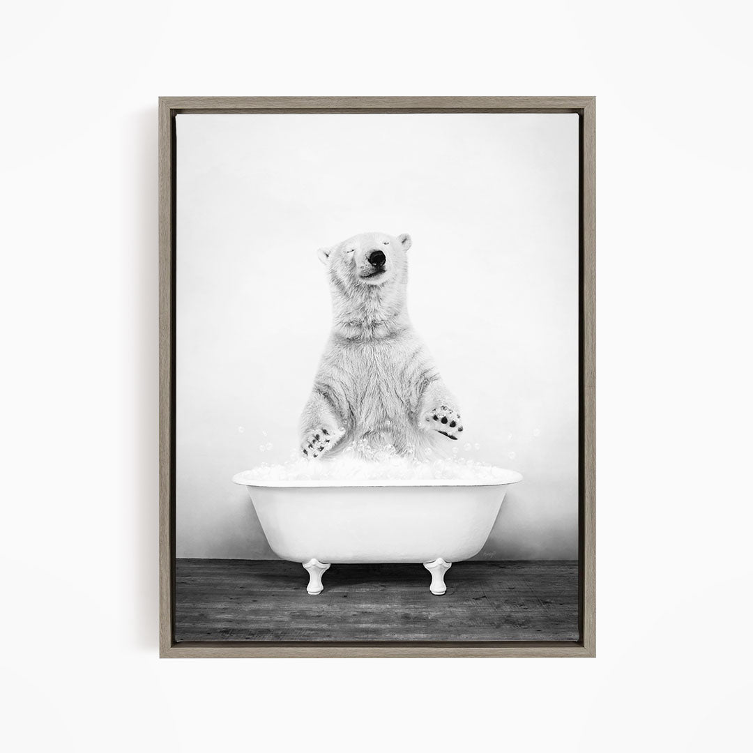 A polar bear standing in a bathtub filled with water, appearing to be enjoying a bath.