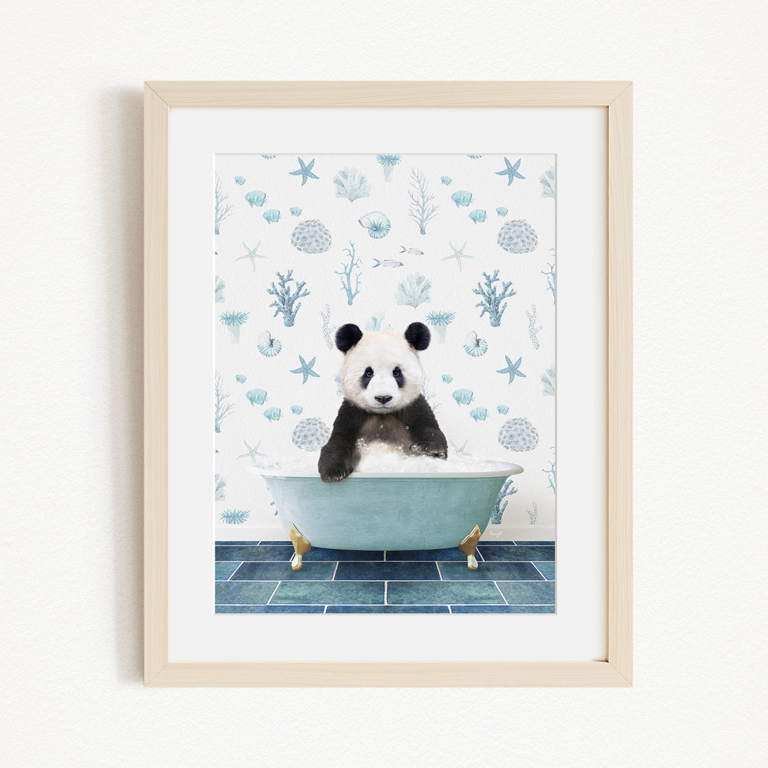 A panda bear sitting in a bathtub filled with bubbles, surrounded by a blue and white ocean-themed wallpaper.