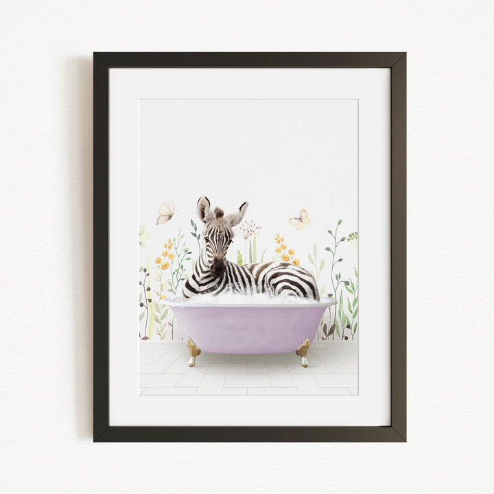 A zebra is sitting in a purple bathtub, surrounded by flowers and butterflies, in a framed artwork.
