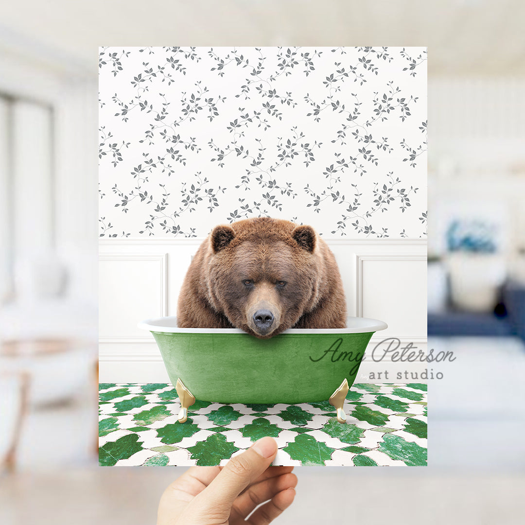 a brown bear sitting in a green bath tub