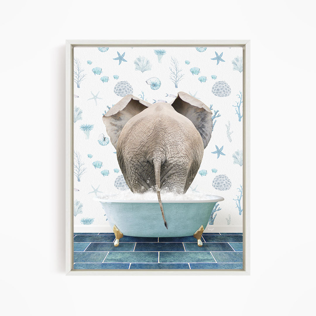 An elephant is sitting in a bathtub filled with water, surrounded by blue and white seashells and starfish on the wall behind it.