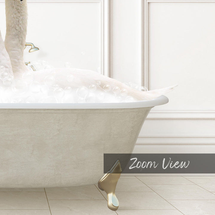 A white bathtub filled with bubbles, with a gold faucet and a gold bathtub brush.