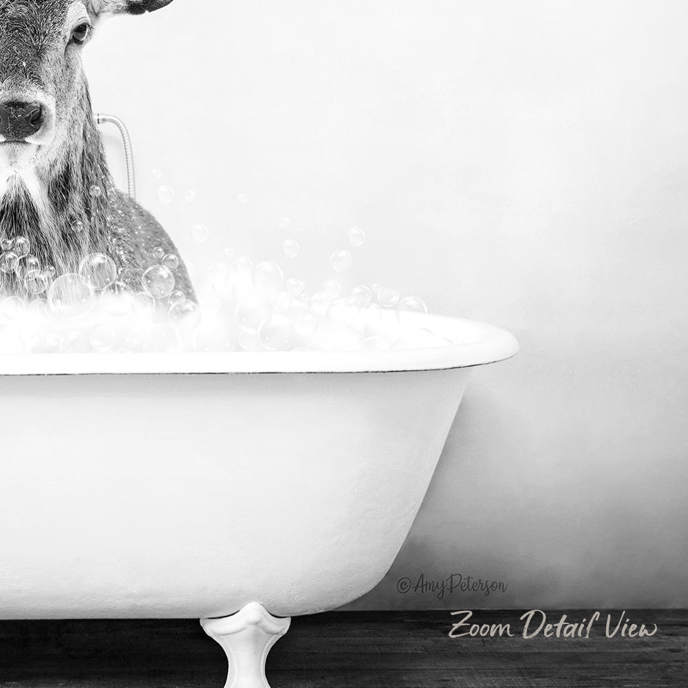 A deer standing in a bathtub filled with bubbles, creating a whimsical and playful scene.